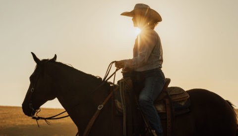Woman rancher on horseback