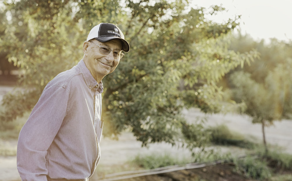 Frank Assali in almond orchard